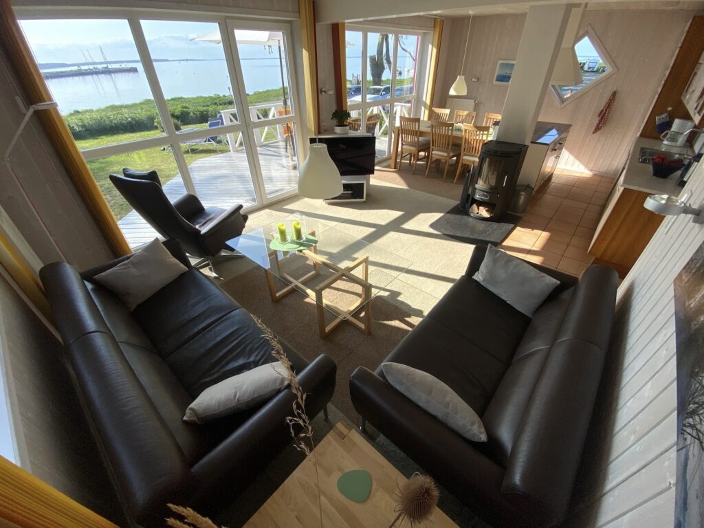 Ferienhaus WackerMagic Wohnzimmer mit Meerblick